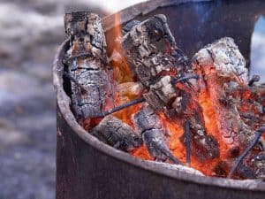 burning a fire in a trash can turkey