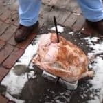 putting the trash can turkey on the bricks and rebar