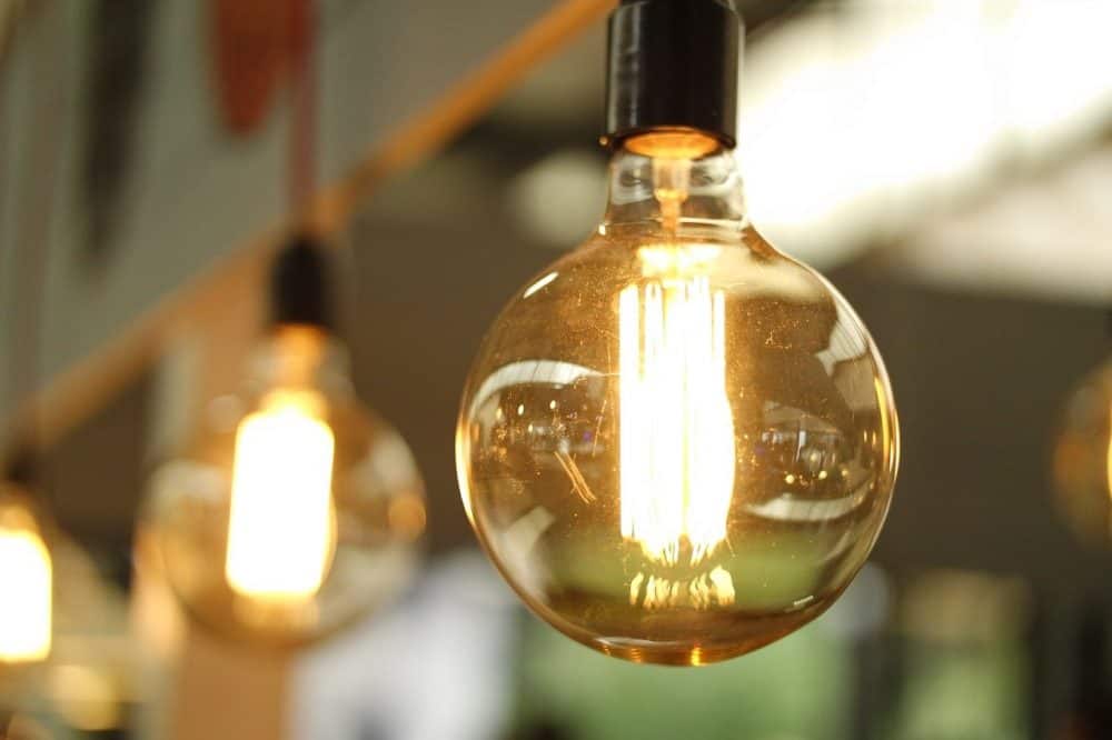 a light bulb to show how energy efficient infrared grills can be.