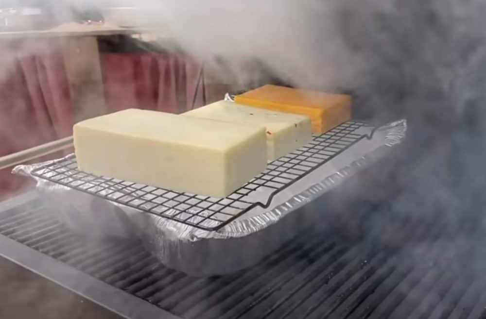 smoking gouda cheese over an ice bath