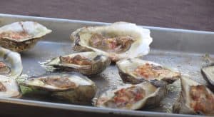 smoked oysters coming out of the smoker