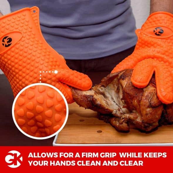 Silicone grilling gloves taking apart meat