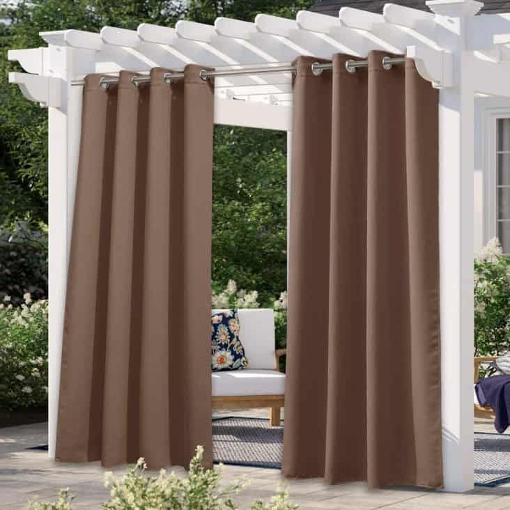 stylish curtains to provide outdoor shade in the backyard patio