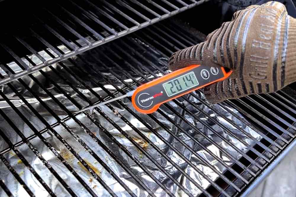 instant read thermometer on grate of Zgrills pellet grill