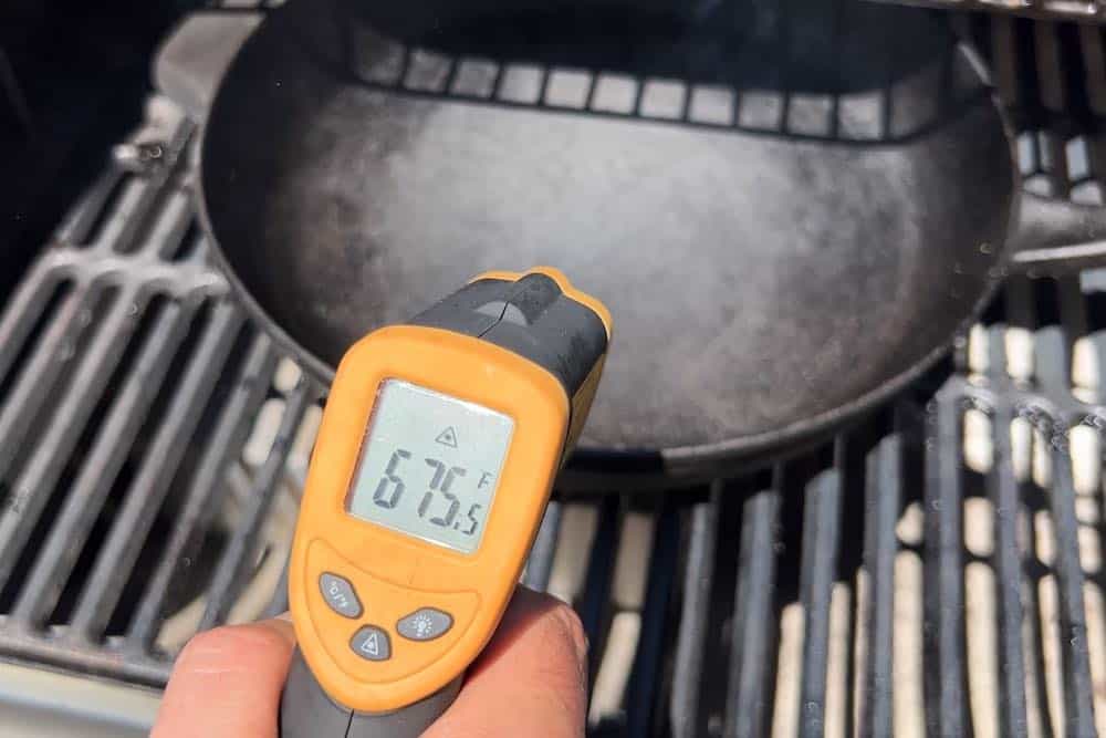 cast iron pan over direct heat on pellet grill