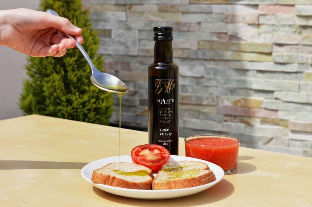 extra virgin olive oil poured on bread
