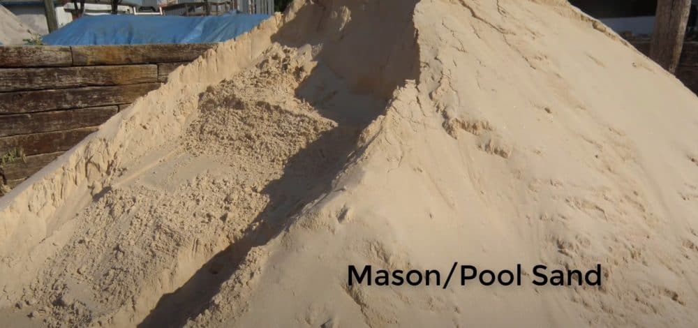 masonry sand pile to be used for base to level the pool