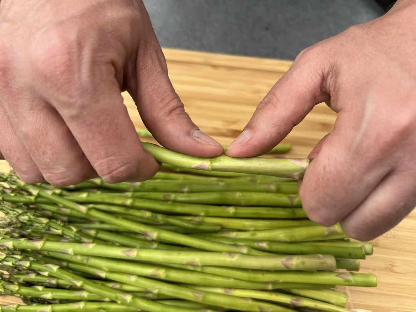 about to break asparagus before smoking