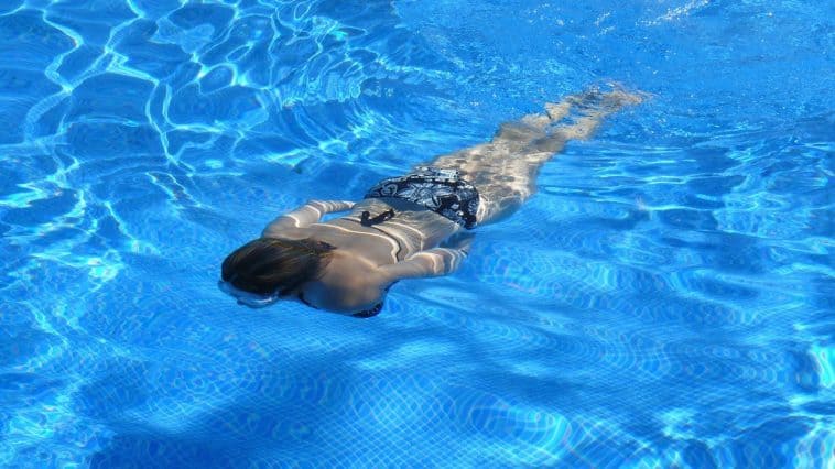 woman swimming in well chlorinated pool