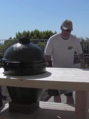 a man building a diy smoker stand