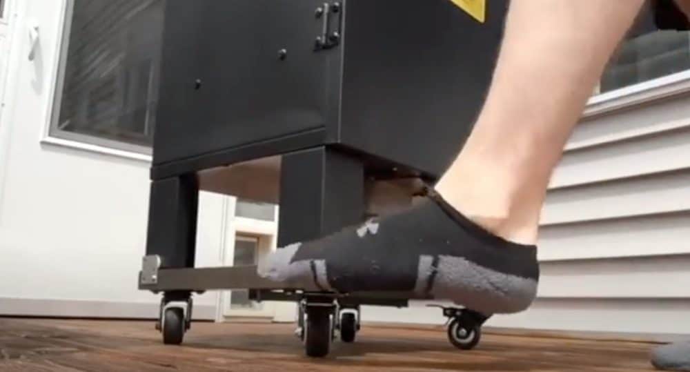 locking the casters on a DIY smoker stand