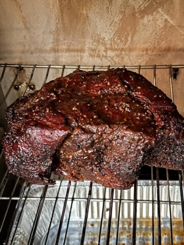 Chuck roast smoking in a Masterbuilt electric smoker