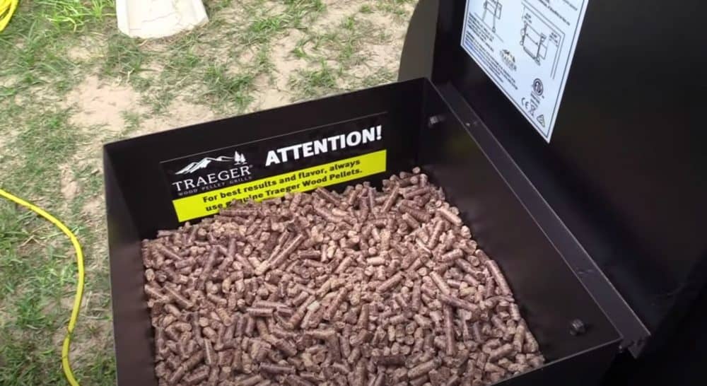 Traeger hopper filled with wood smoking pellets