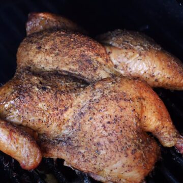 smoked spatchcocked chicken ocooking n a pellet grill
