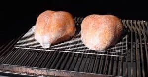 raw turkey breasts on a pellet grill