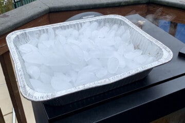 an aluminum foil pan filled with ice