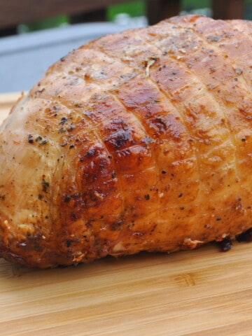 Pit Boss Smoked Boneless Turkey Breast on a cutting board