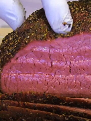 a smoked bottom round beef roast sliced