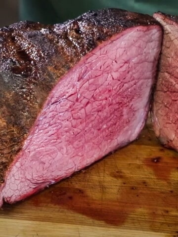 a sliced medium rare rump roast