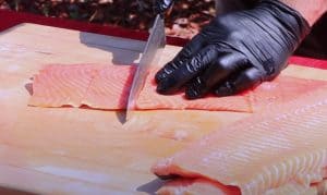 cutting fillets of salmon