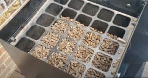 pellets in the hopper of a pit boss pellet grill