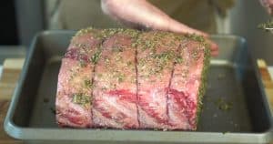 seasoned prime rib going on a traeger grill