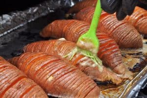 basting butter on smoked sweet potatoes