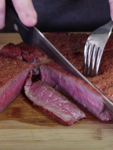 slicing a smoked london broil