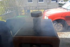 smoke coming from a pit boss vertical smoker