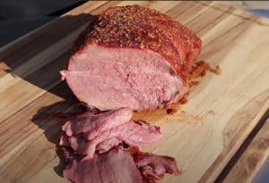 a finished smoked eye of round roast beef