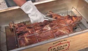 roasting a pig in a caja china