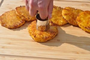 removing the core form smoked pineapple slices