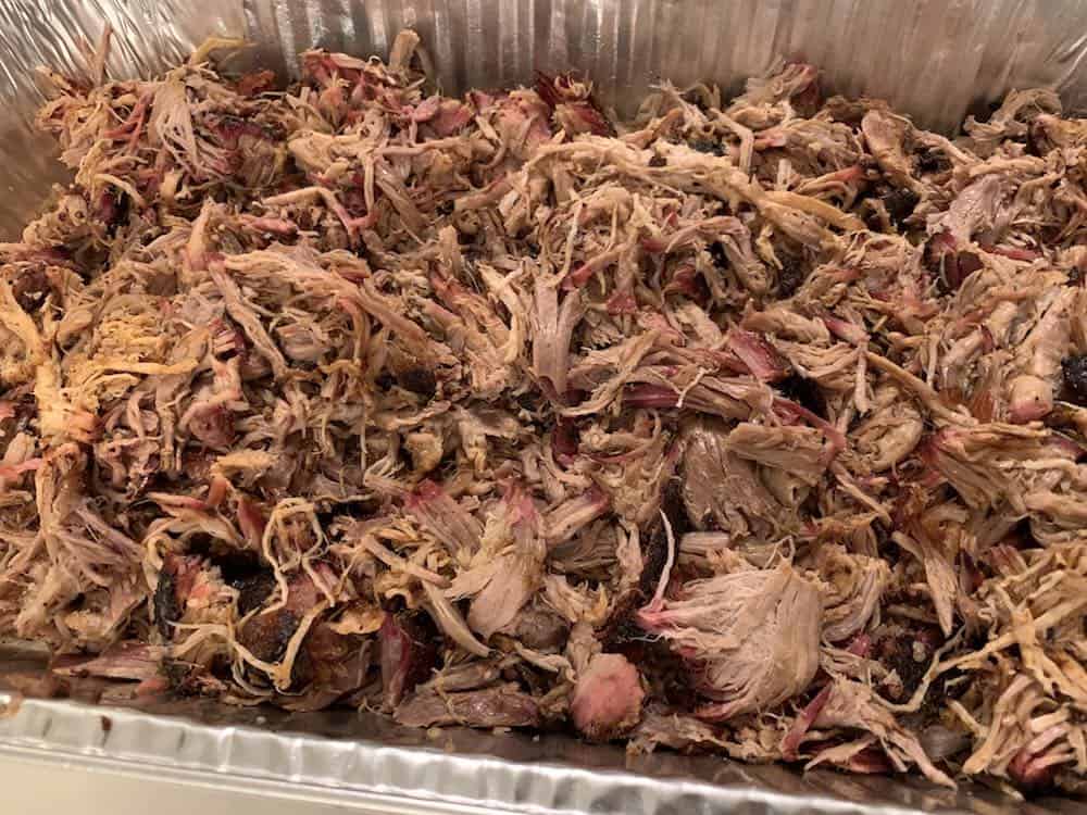 a tray of pit boss smoked pulled pork