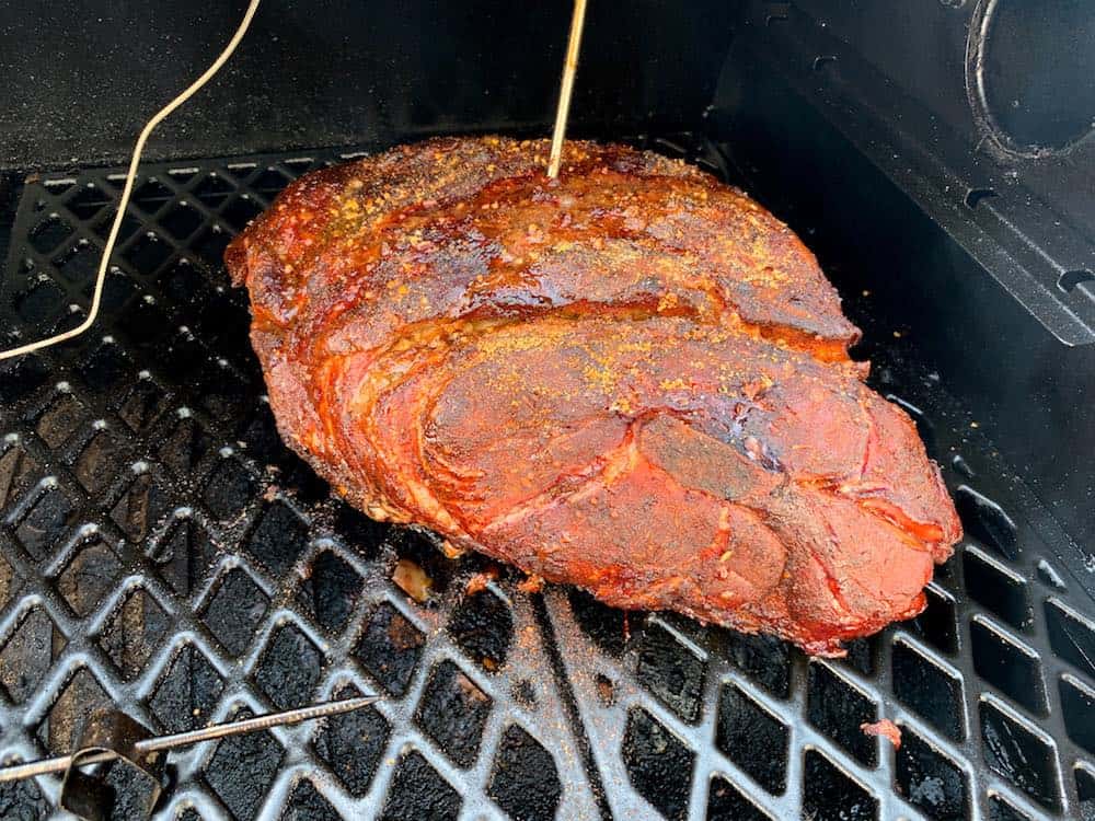 a smoked pork butt in a pit boss pellet grill