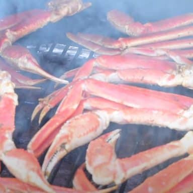 smoked crab legs on a grill