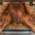 smoked spatchcock turkey made on a pellet grill