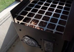 a hopper with pellets in a pit boss pellet grill