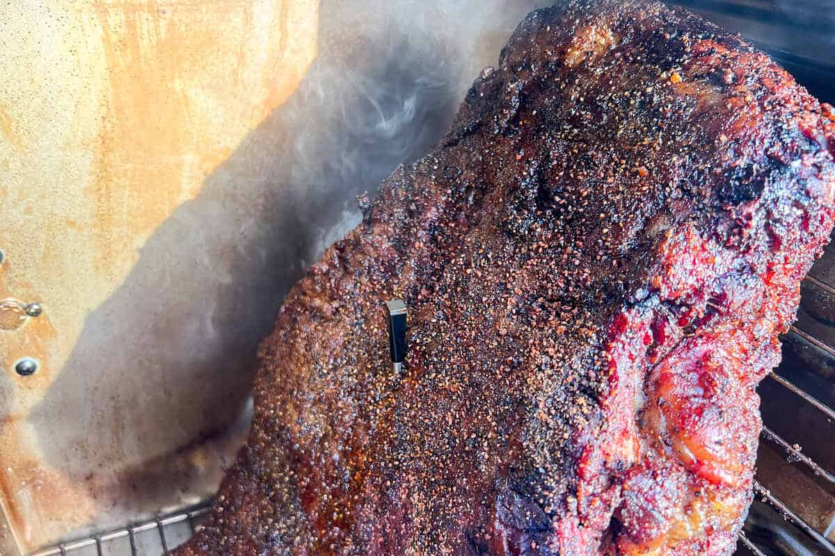 a MEATER wireless thermometer in the brisket