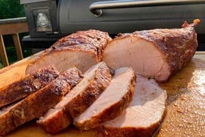 1-inch slices of pork loin sliced on a cutting board