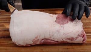 a full size raw pork loin