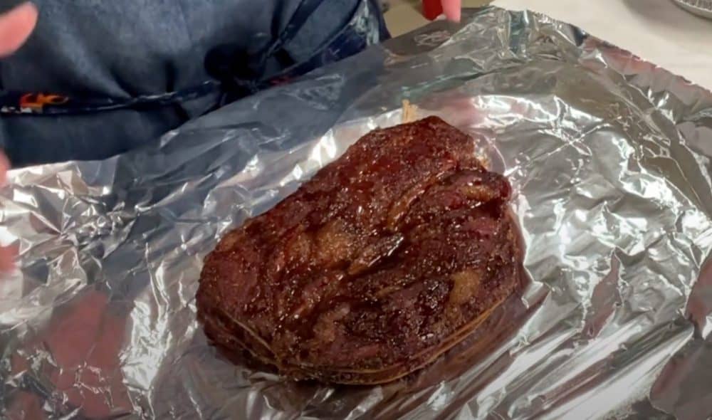 wrapping a smoked chuck roast in foil