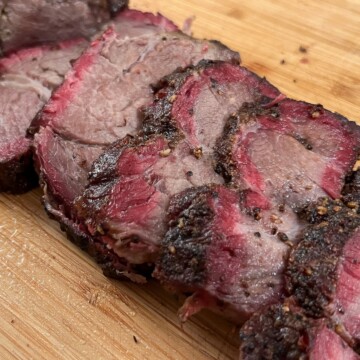 slices of smoked chuck roast on a cutting board