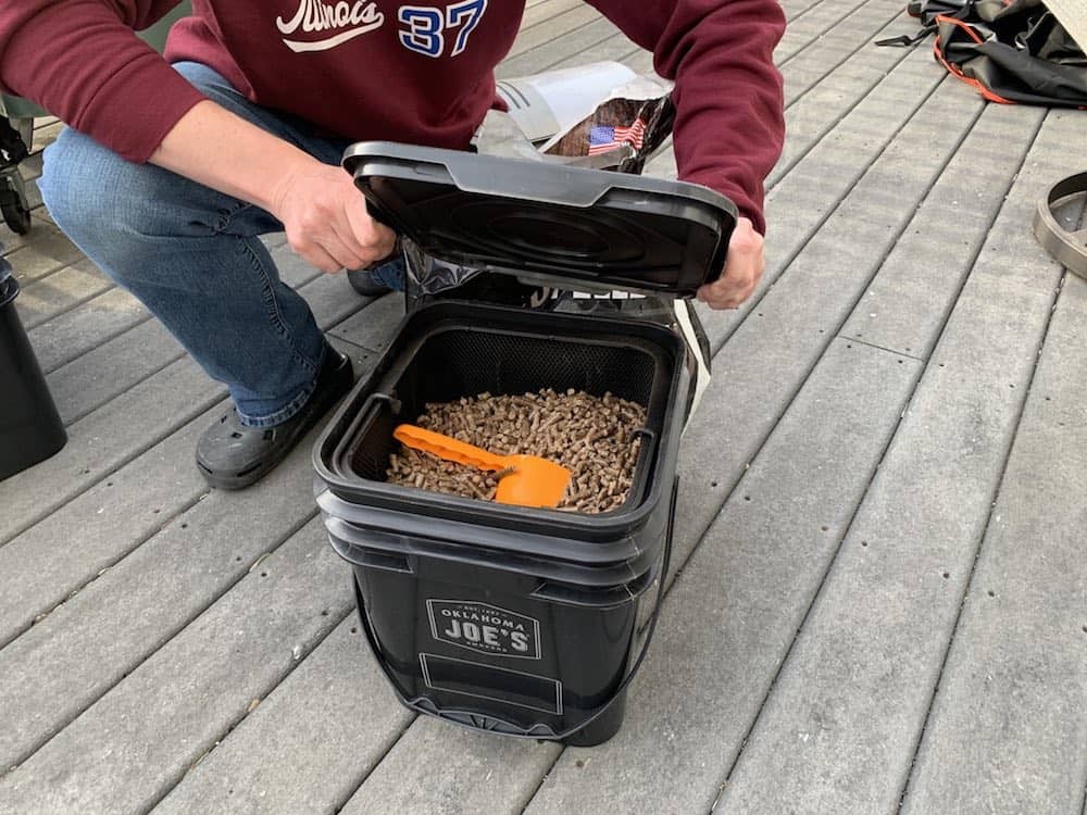 Oklahoma Joe's pellet bucket filled with pellets