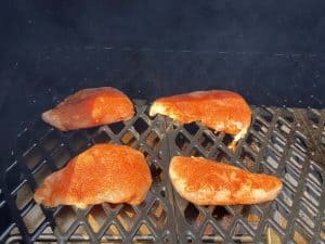 chicken breasts smoking on a pit boss
