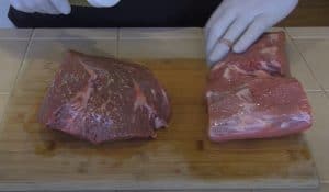 applying oil to bottom round beef roasts for smoking