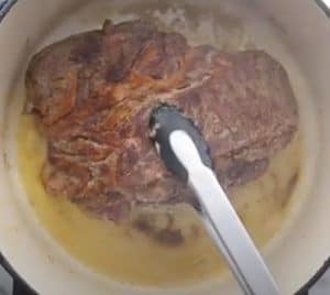 searing a pot roast after smoking on a traeger