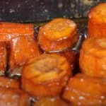 smoked carrots with a honey balsamic glaze in a baking dish