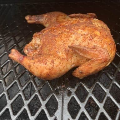 a smoked chicken on a pit boss pellet grill