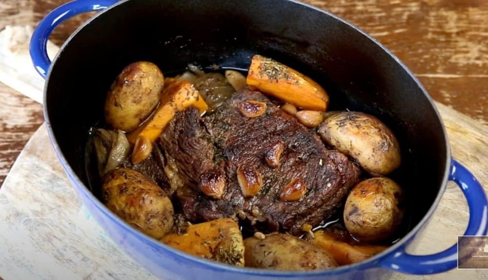a smoked pot roast in a dutch oven
