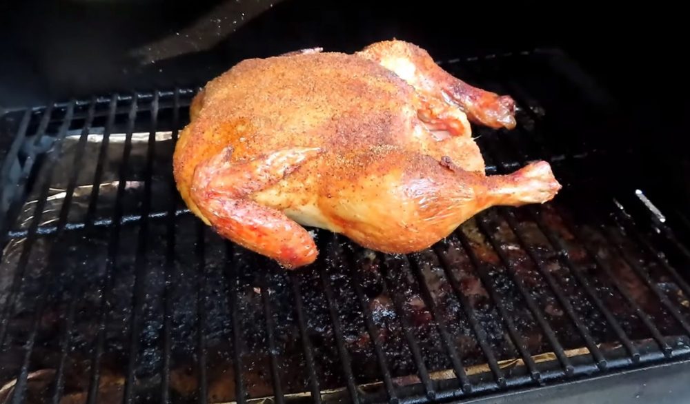 a whole chicken smoked on a traeger pellet grill